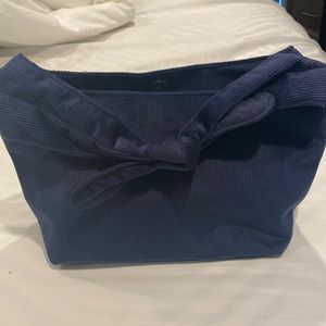 Cute little navy blue corduroy bag.